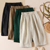 Four pairs of women's cotton linen harem shorts in black, brown, green and beige