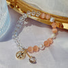 Crystal and Cat's Eye Charm Bracelet with Star, Moon and Flower Beads