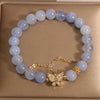 Blue Crystal Butterfly Bracelet with Gold-Tone Accents