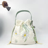 Embroidered Drawstring Bucket Bag with Tassel, Floral and Animal Motifs
