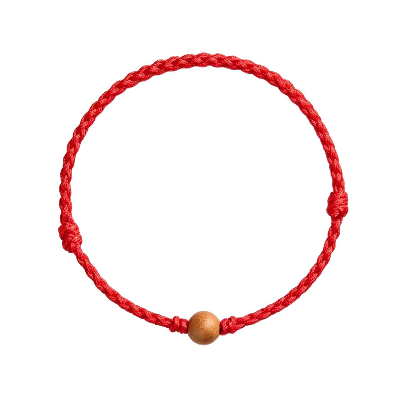 Close up view of a red braided cord bracelet with a small wooden bead