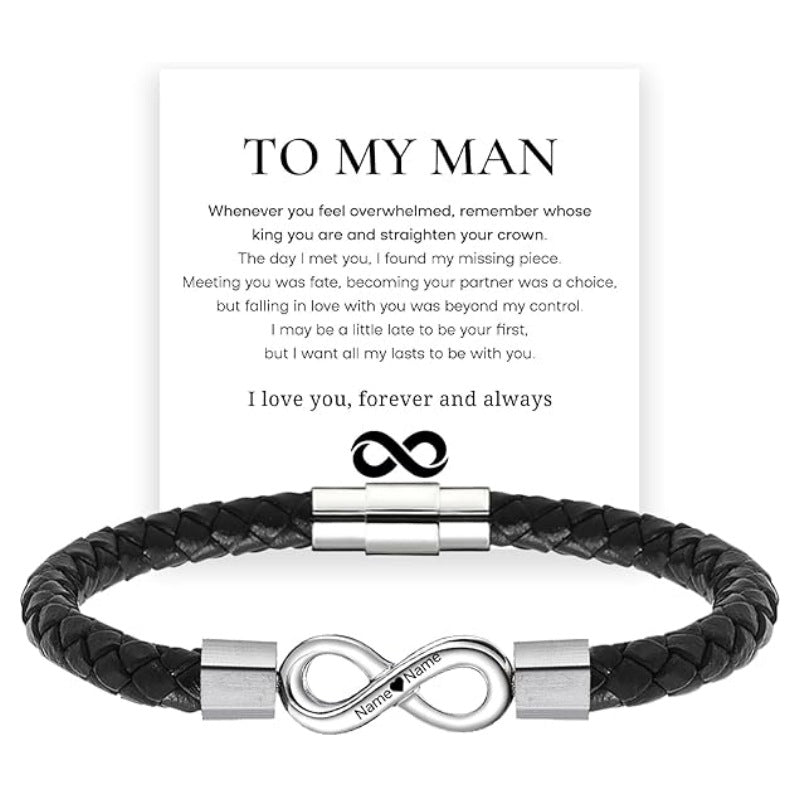 Black braided leather bracelet with silver infinity charm on wrist