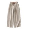 Front view of beige wide-leg cotton linen pants with elastic waistband