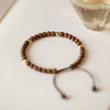 Adjustable Golden Silk Sandalwood Bracelet with Gold-tone Beads