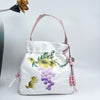 Embroidered Drawstring Bucket Bag with Tassel, Floral and Animal Motifs