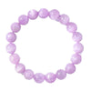 Close up view of a lavender Kunzite beaded bracelet on a white background
