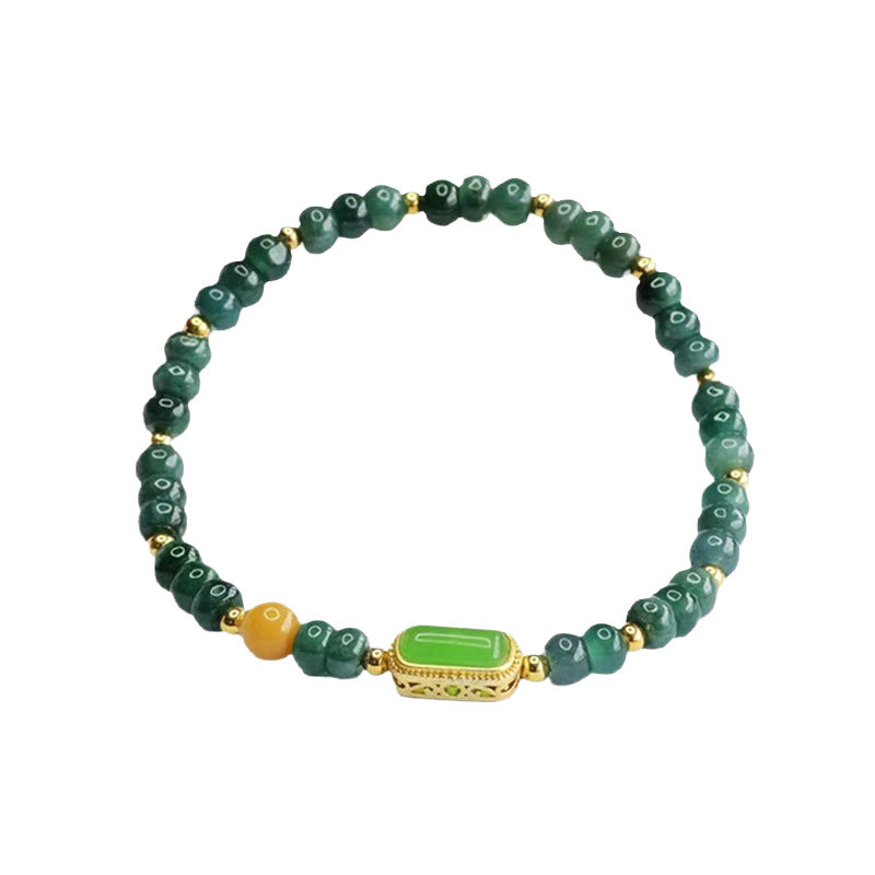 Green abacus bead bracelet with a rectangular green stone charm and gold accents on a white background