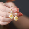Bodhi Seed Cat Paw Earrings with Gold-Tone Hook