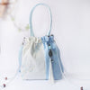 Embroidered Canvas Crossbody Bag with Tassels