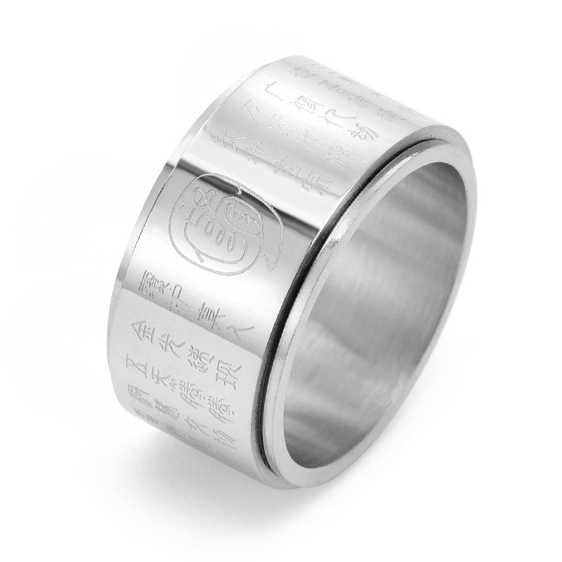 Silver-tone titanium steel spinner ring with engraved mantras on a white background
