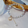 Crystal and Cat's Eye Charm Bracelet with Star, Moon and Flower Beads