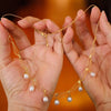 Gold-Tone Multi-Strand Pearl Necklace with Geometric Design