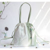 Embroidered Canvas Crossbody Bag with Tassels