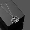 Silver tone stainless steel necklace with a hollow lotus flower pendant on a black box