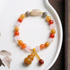 Golden Silk Jade Gourd Charm Bracelet