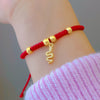 Year of the Snake Red String Bracelet with Peace Buckle Charm