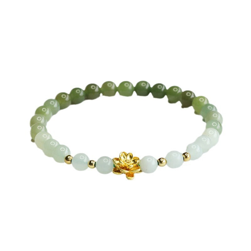 Gradient green and white jade bead bracelet with a gold lotus charm on a white background