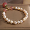 Freshwater Pearl Bracelet with Peach or Persimmon Charm