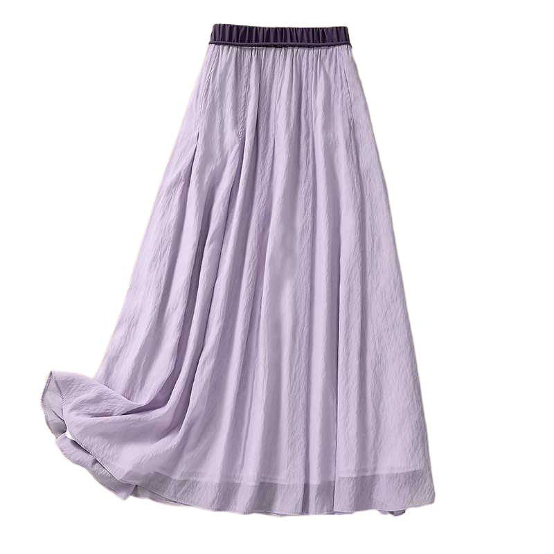 Light purple pleated midi skirt with dark elastic waistband on white background