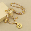 Long Faux Tiger Eye Necklace with Gold-Tone Compass Pendant