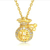 Close up of gold tone money bag pendant with Fu character on a white background