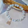 Crystal and Cat's Eye Charm Bracelet with Star, Moon and Flower Beads