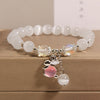 Cat's Eye Charm Bracelet with Flower, Bear and Swan
