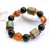 Nine-Eye Dzi Bead Black Agate Bracelet