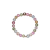 Close-up of a multi-colored crystal bead ring on a white background