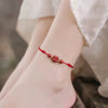 Cinnabar Flower Anklet, Red and Black Cord