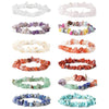 A collection of handmade bracelets made from irregular colorful crystal chips on a white background