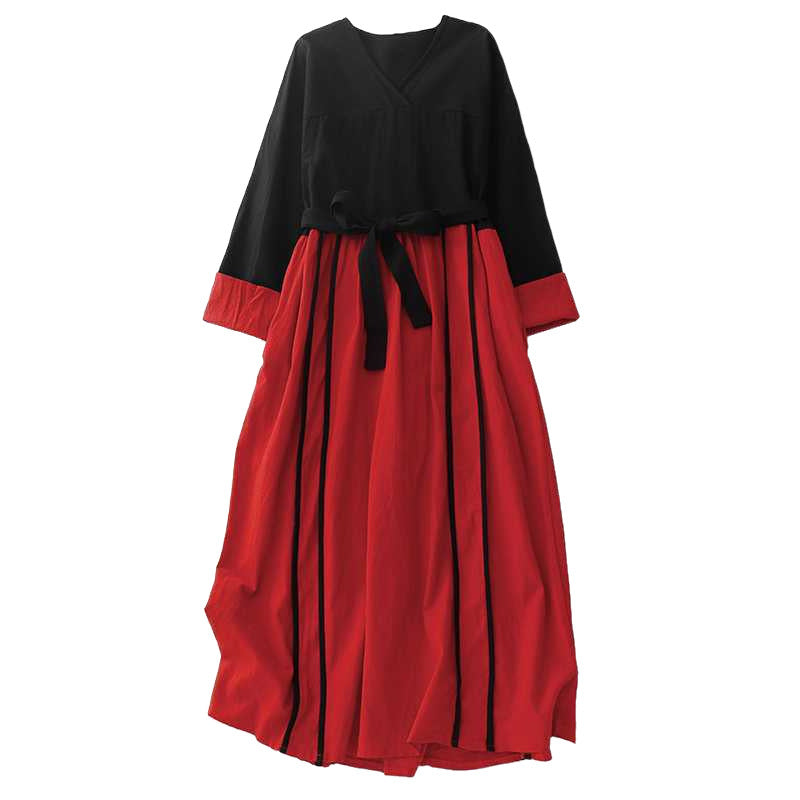 Front view of a black and red color block long sleeve midi dress