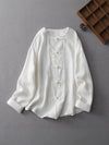 White long sleeve women's shirt with traditional buttons