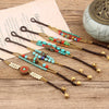 Handwoven Tibetan Style Beaded Bracelet with Bell Charm