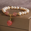 Freshwater Pearl Bracelet with Peach or Persimmon Charm