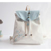Embroidered Canvas Crossbody Bag with Tassels