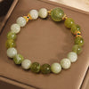 Green Jade Bead Bracelet with Gold-Tone Spacers