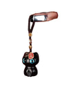 Black sandalwood lucky cat keychain with blue eyes hanging on a brown cord