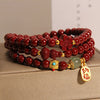 Cinnabar Triple Wrap Bracelet with Gourd and Flower Charms
