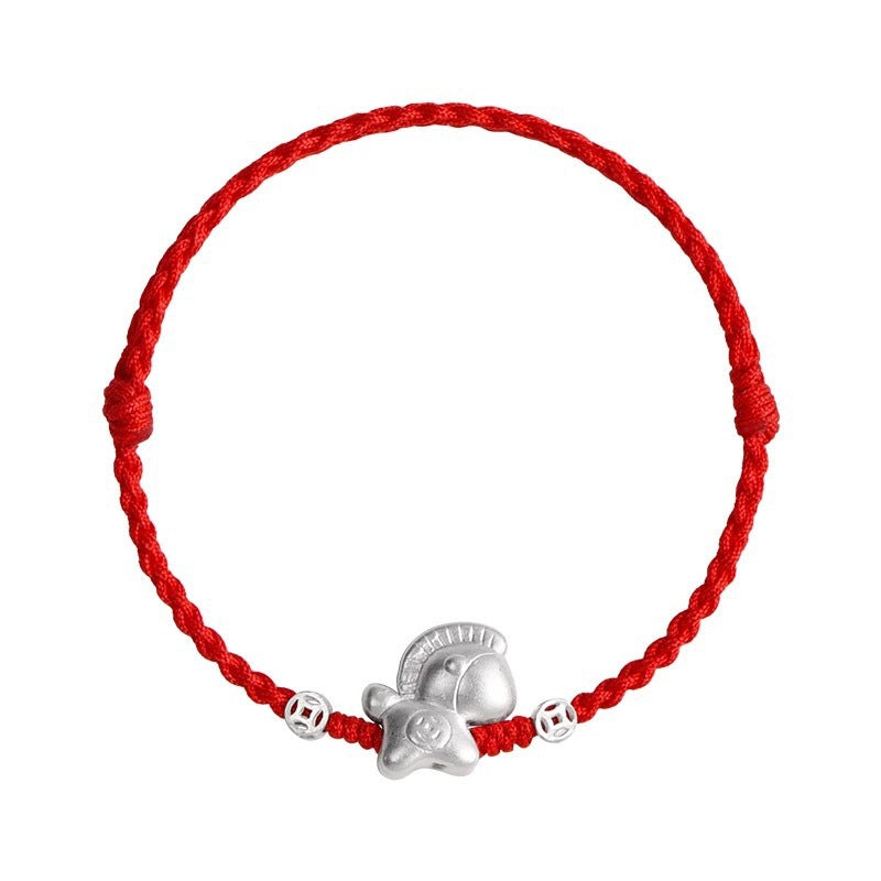A braided rope bracelet with a silver horse charm and small coin beads