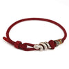 Wine red braided cord bracelet with silver snake charm and colorful beads
