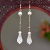 Long Drop Earrings with Floral Charm and Faux Pearl