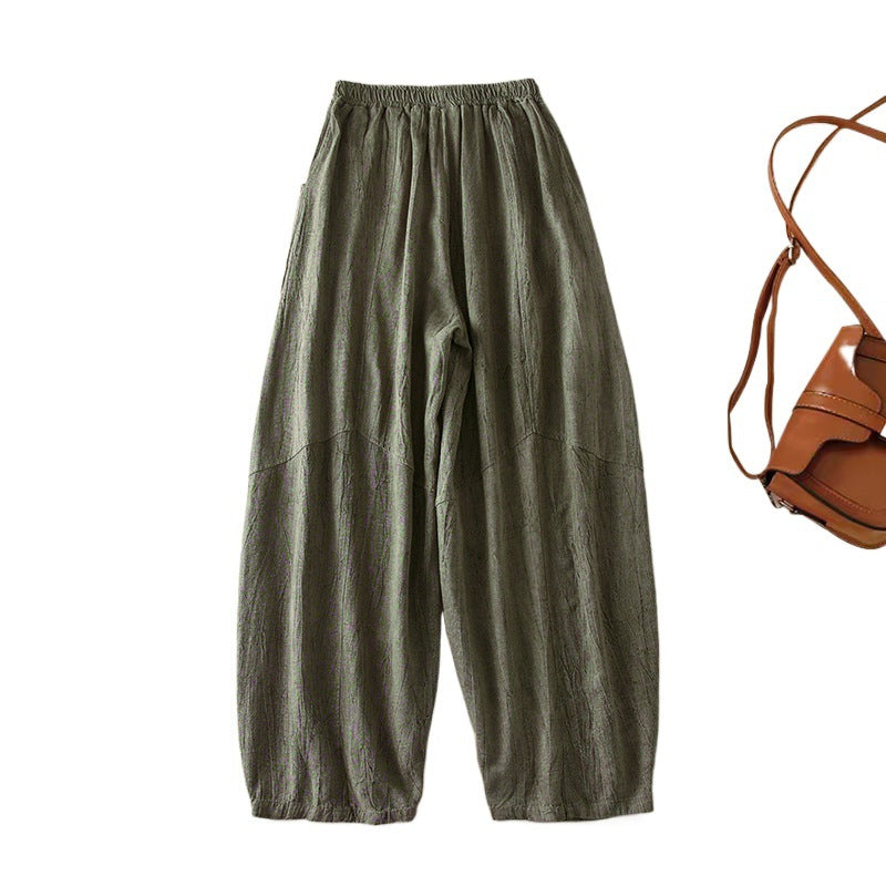 Front view of olive green loose fit linen cotton harem pants for women