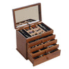 Open wooden jewelry box with multiple drawers and a mirror on the lid