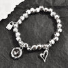 Silver-Plated Beaded Bracelet with Geometric Charms