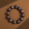 Wood Bead Bracelet with Engraved Charms and Tassel