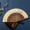 Bamboo Folding Fan with Yellow Paper and Tassel