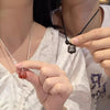 Silver Sheen Obsidian and Pink Stone Lion Dance Necklace Pendant