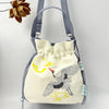Embroidered Drawstring Bucket Bag with Tassel, Floral and Animal Motifs