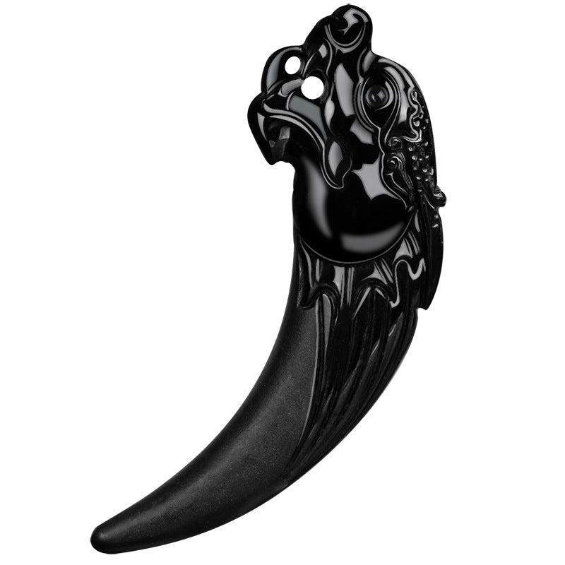 Close up view of the black jade dragon tooth pendant on a beaded cord